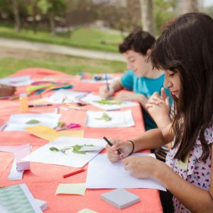 Children working on art outdoors